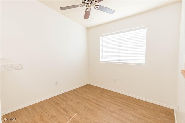 spare room featuring ceiling fan and light hardwood / wood-style floors