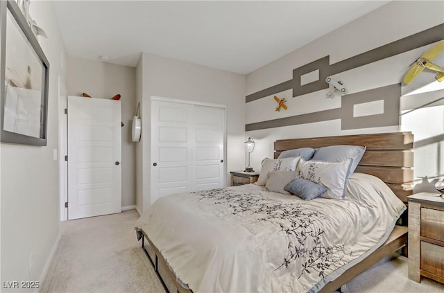 carpeted bedroom featuring a closet