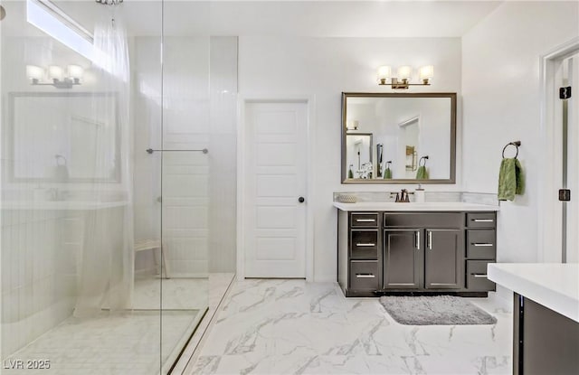 bathroom with a shower and vanity