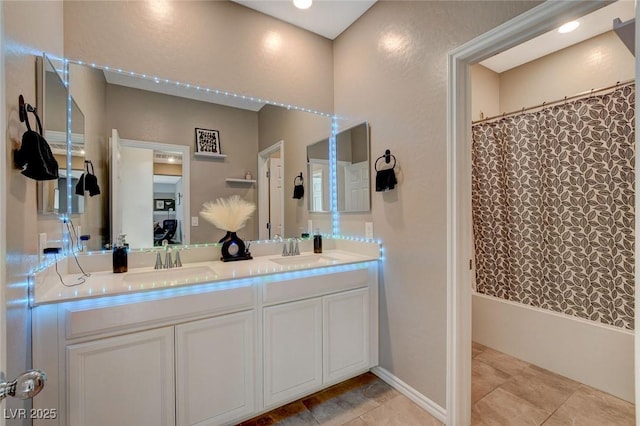 bathroom with shower / bath combo and vanity