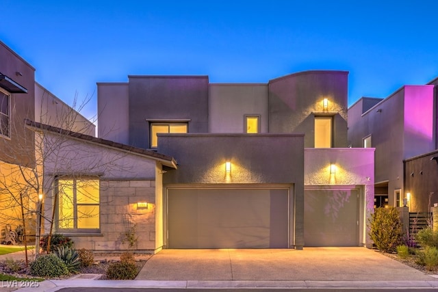 view of front of home with a garage