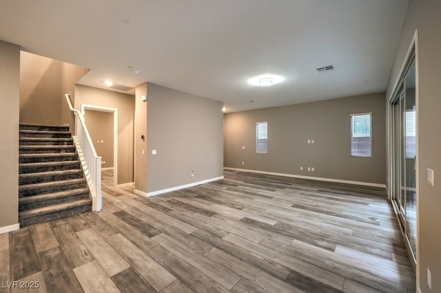 interior space featuring a healthy amount of sunlight and light hardwood / wood-style floors