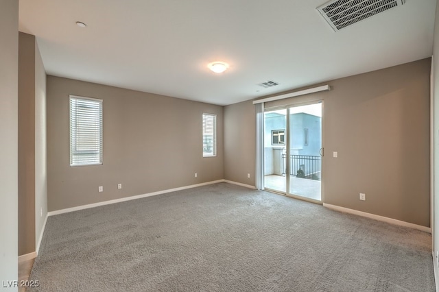 view of carpeted spare room