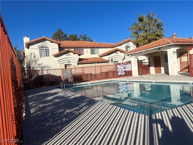 view of pool featuring a patio