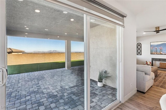 interior space featuring hardwood / wood-style floors and plenty of natural light