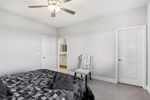 bedroom with ceiling fan and light colored carpet