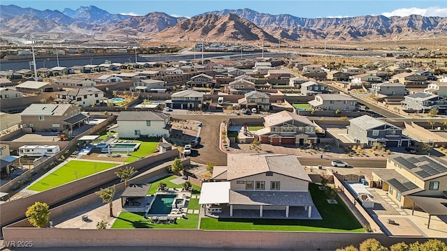 drone / aerial view featuring a mountain view