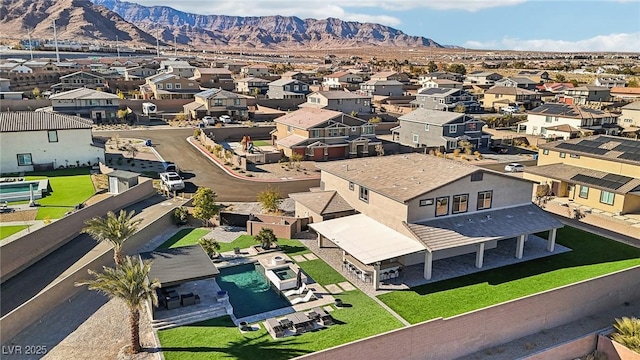 bird's eye view with a mountain view