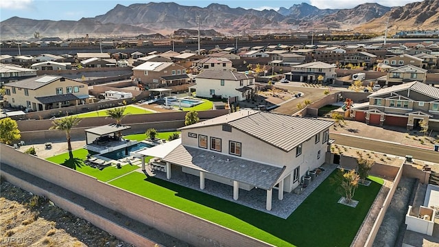 bird's eye view with a mountain view