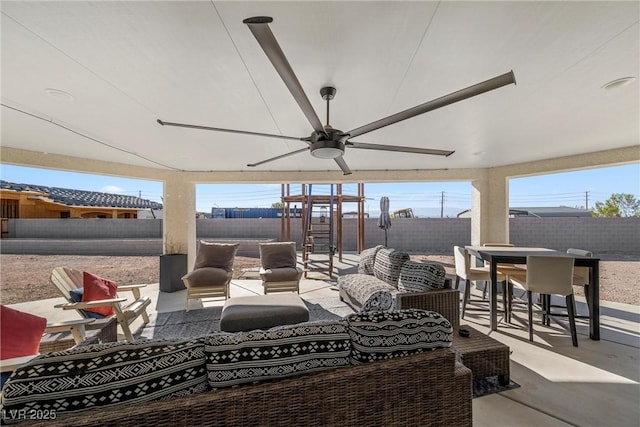 view of patio with ceiling fan and outdoor lounge area