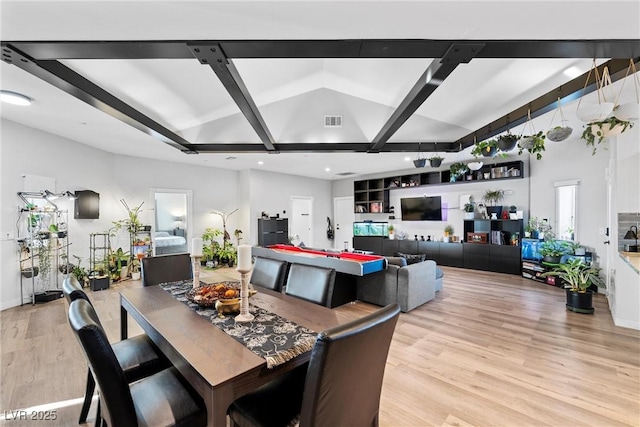 dining area with light hardwood / wood-style flooring