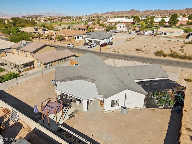 drone / aerial view featuring a mountain view