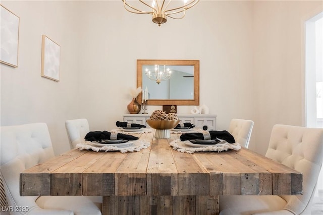 dining area with a notable chandelier