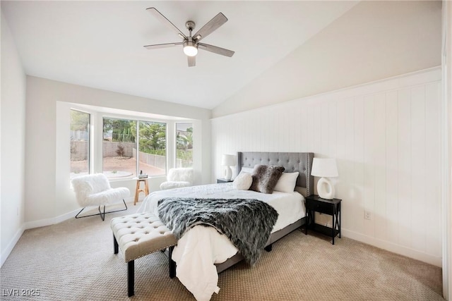 bedroom featuring lofted ceiling, light carpet, and ceiling fan