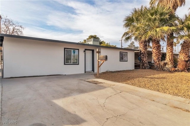 rear view of house with a patio