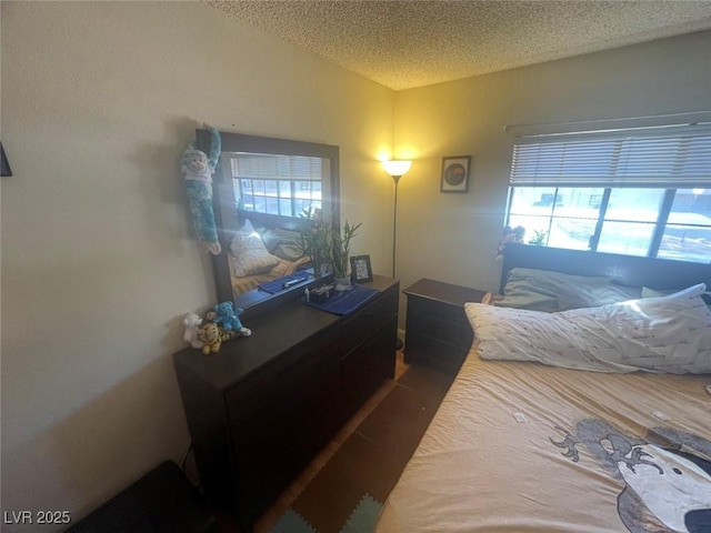 bedroom featuring a textured ceiling