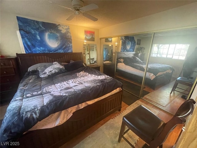 bedroom with ceiling fan and a closet