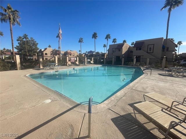 view of swimming pool featuring a patio