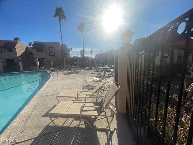 view of swimming pool featuring a patio