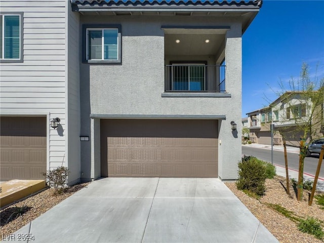 view of front of home with a garage