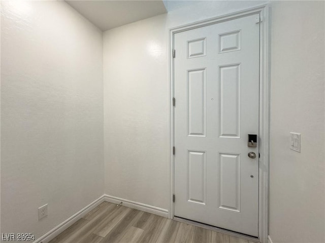 doorway to outside featuring light hardwood / wood-style floors