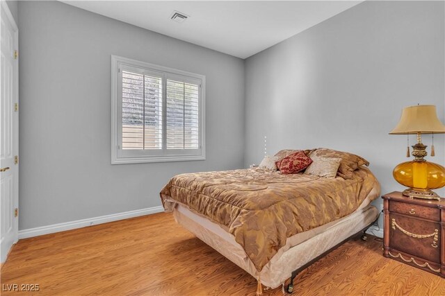 bedroom featuring light wood-type flooring