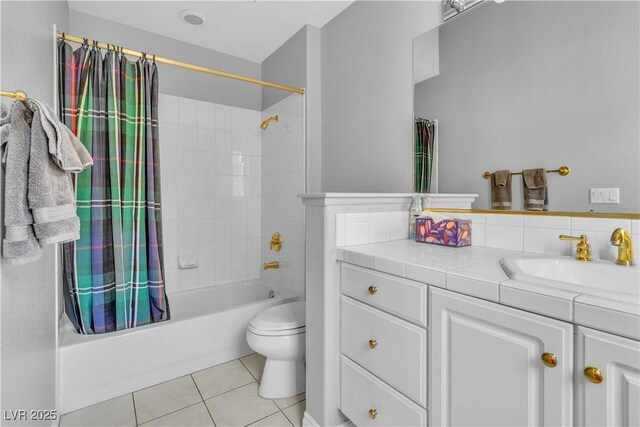 full bathroom with toilet, tile patterned floors, shower / bath combo, and vanity