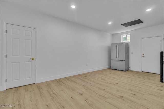 unfurnished room featuring light wood-type flooring