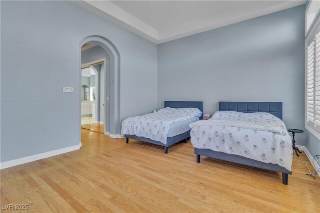 bedroom with light hardwood / wood-style flooring