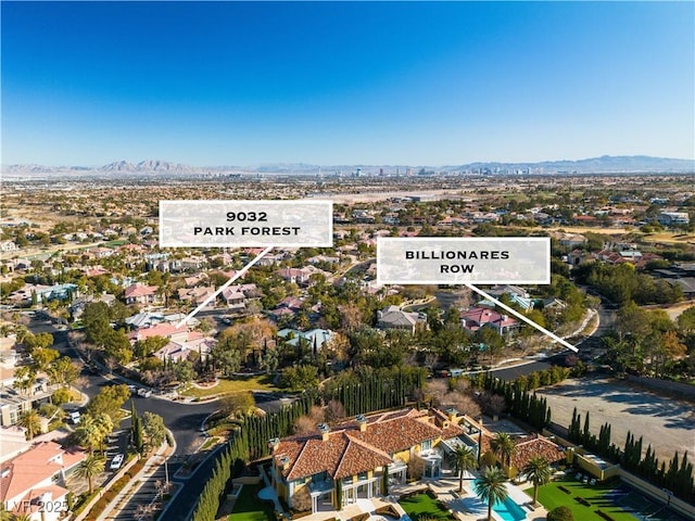 drone / aerial view featuring a mountain view