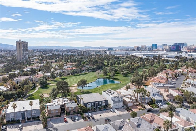 bird's eye view featuring a water and mountain view