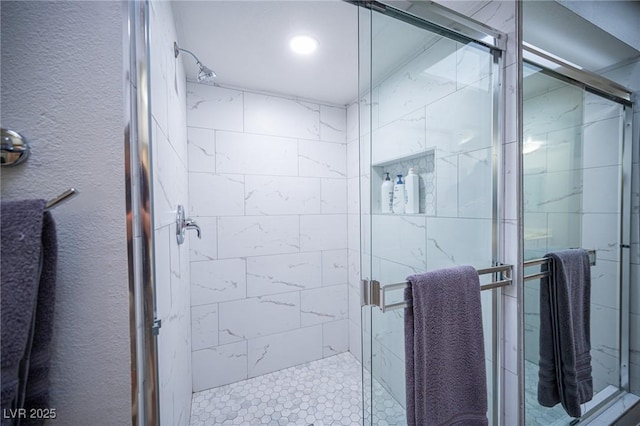 bathroom featuring walk in shower