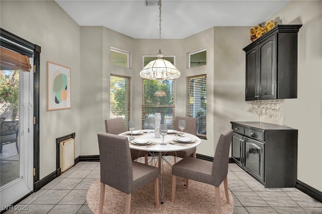 tiled dining room with plenty of natural light