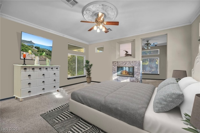 bedroom featuring a fireplace, carpet floors, ceiling fan, and ornamental molding