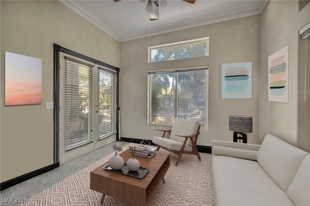 living room with ceiling fan and light colored carpet