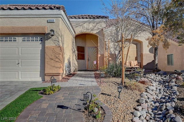 property entrance featuring a garage