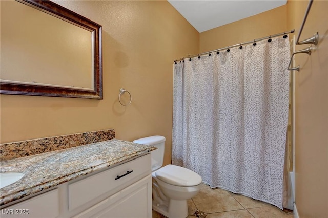 full bathroom with toilet, vanity, tile patterned flooring, and shower / bath combination with curtain