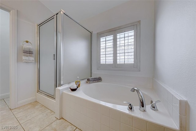 bathroom featuring separate shower and tub and tile patterned flooring