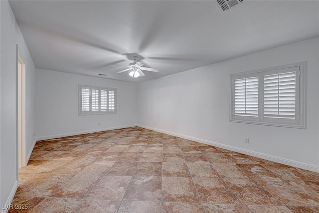 unfurnished room with ceiling fan