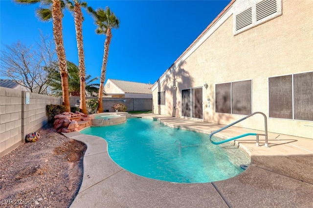 view of pool featuring an in ground hot tub and a patio