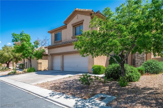 view of front of home featuring a garage