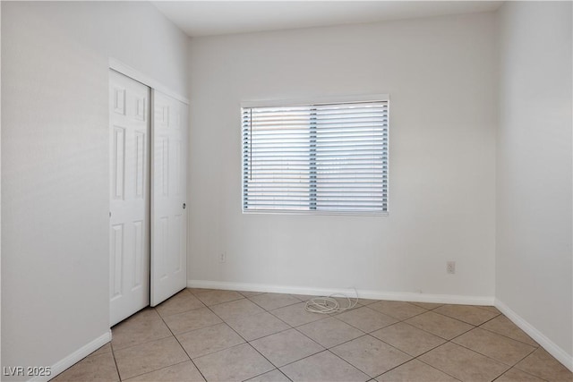 view of tiled spare room