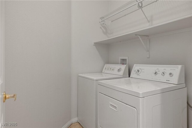 washroom featuring washer and dryer