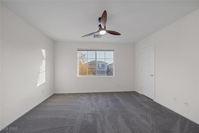 carpeted empty room with ceiling fan