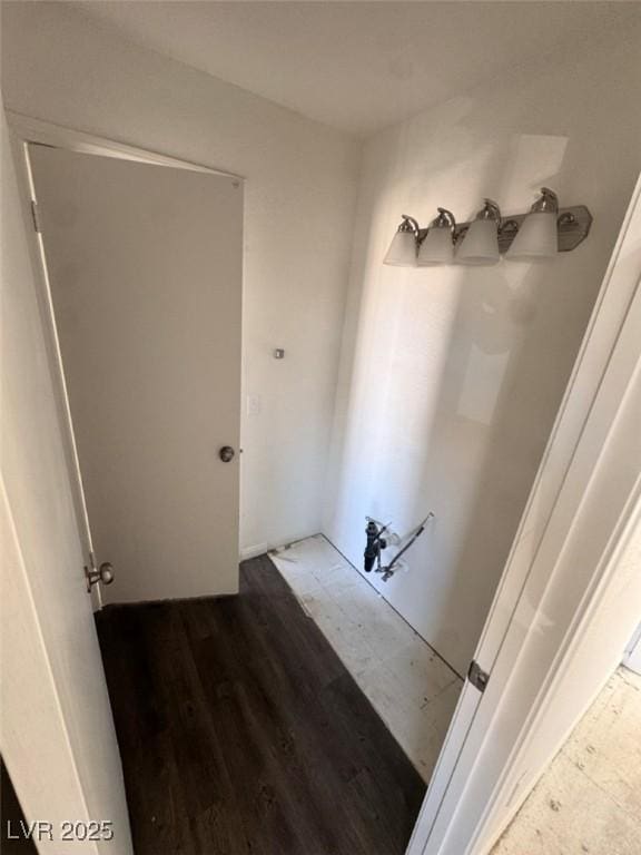 bathroom with hardwood / wood-style floors