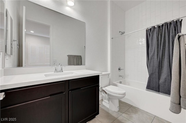 full bathroom with toilet, tile patterned flooring, vanity, and shower / bath combo with shower curtain