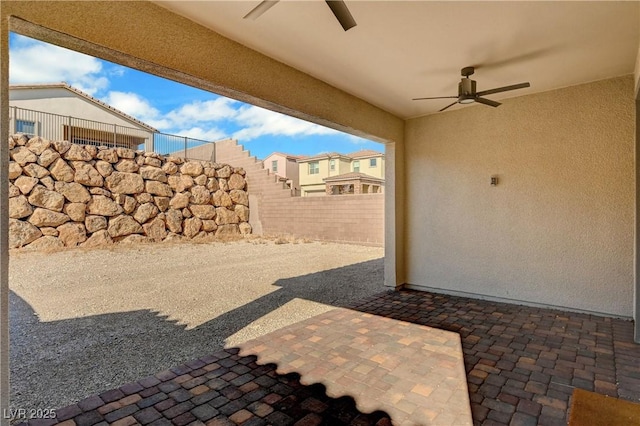 view of patio with ceiling fan