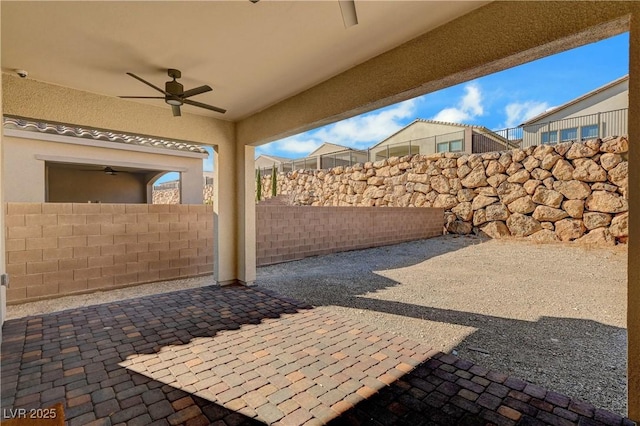 view of patio / terrace with ceiling fan