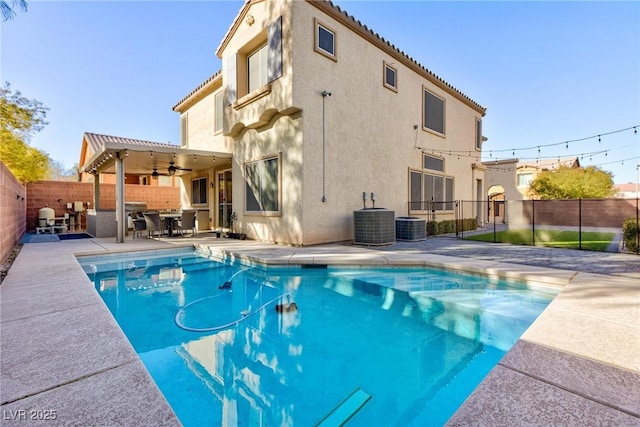 view of pool featuring a patio, ceiling fan, central AC, and a pergola