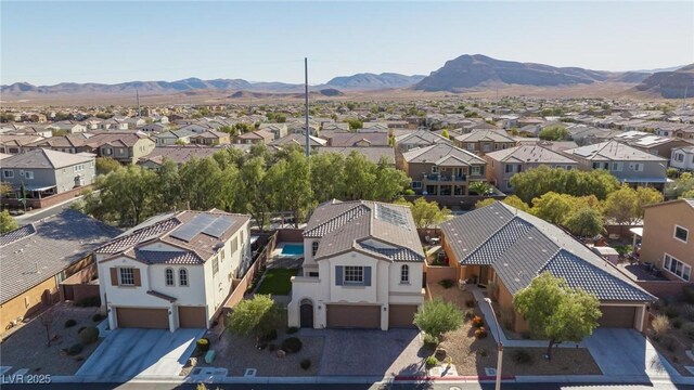 drone / aerial view featuring a mountain view